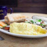 Leila's Omelet · Fresh tomatoes, spinach, mushrooms and Cheddar cheese.
