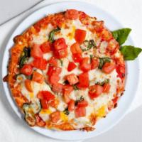 Margherita Pizza · Classic red sauce, garlic, tomatoes, basil and olive oil.