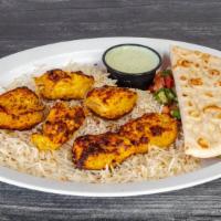 Chicken Tikka Kabob · Cubed chicken breast mixed with a blend of tomatoes, onions, cilantro, chilis, and spices.