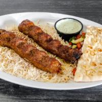 Lamb Chili Kabob · Ground lamb, mixed with a blend of bell peppers, onions, chilis, and spices.