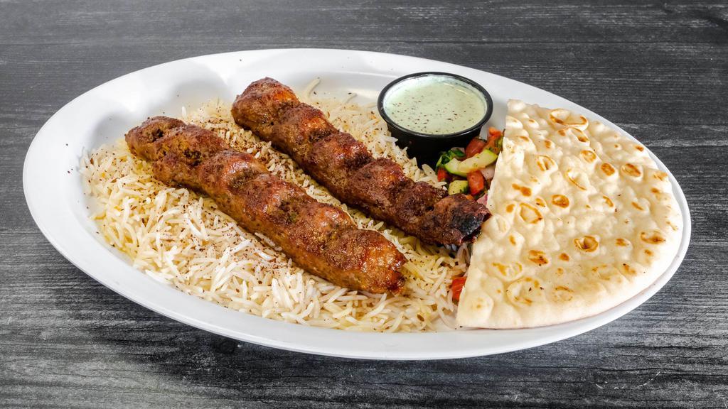 Lamb Chili Kabob · Ground lamb, mixed with a blend of bell peppers, onions, chilis, and spices.