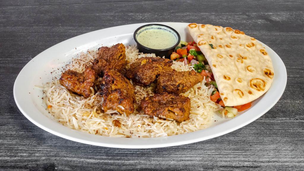 Beef Tikka Kabob · Cubed beef mixed with a blend of onions, garlic, chilis, and spices.
