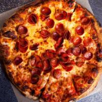 Classic Pepperoni Pizza · Thin and crispy crust made with our daily made, fresh pizza dough. Topped with mounds of str...