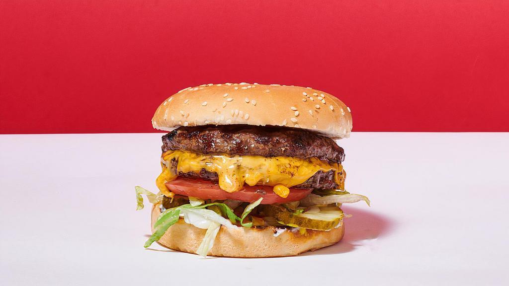 Double Cheese Burger · American Cheese, Lettuce, Tomatoes, Mayo, Mustard, Ketchup, Pickles and Diced Onions