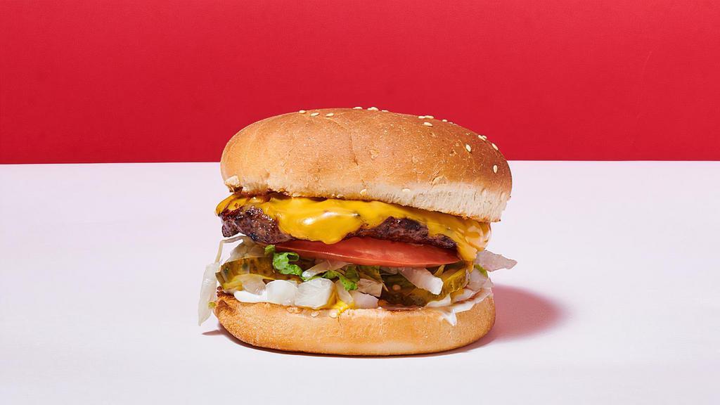 Cheeseburger · American Cheese, Lettuce, Tomatoes, Mayo, Mustard, Ketchup, Pickles and Diced Onions