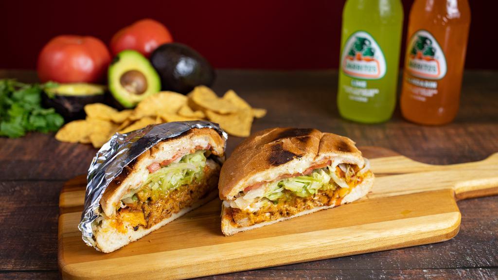 Torta · SPECIAL. Cheese, avocado, sour cream, lettuce, tomato & choice of meat on a bolillo roll.
