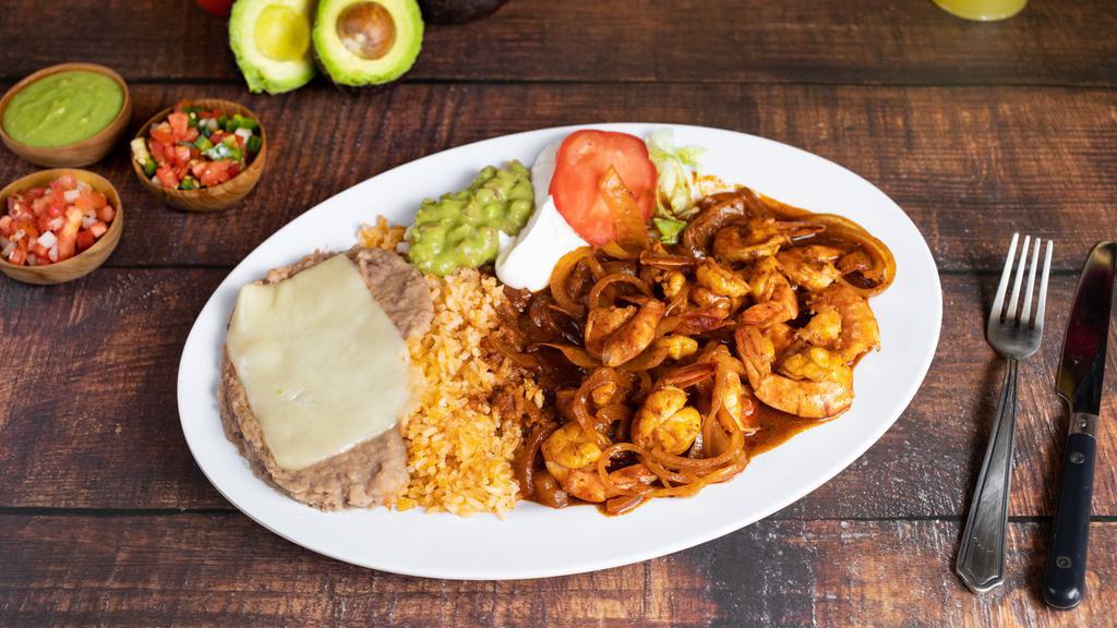 Camarones a La Diabla · SPECIAL. Spicy prawn with cooked in chipotle sauce. Served with rice, beans & tortillas.