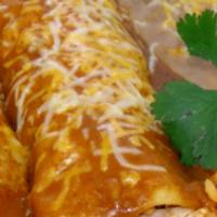 Enchiladas · 2 corn tortilla filled with cheese and your choice of meat topped with red sauce and queso f...