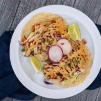 Shrimp Tacos (2) · 2 tacos fill with marinated shrimp, our cabbage, radish, pico de gallo , cilantro slaw, topp...
