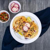 Fish Tacos (2) · 2 tacos fill with tilapia fillets, our cabbage, radish, pico de gallo , cilantro slaw, toppe...