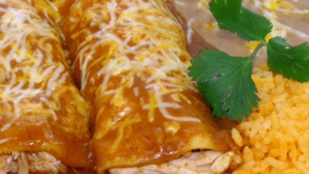 Enchilada · one corn tortilla fill with cheese, choice of meat , topped with red sauce and cheese.