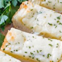 Garlic Bread with Cheese · Freshly baked garlic bread topped with creamy cheese.