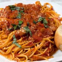 Spaghetti Bolognese · Minced meat in a savory marinara sauce, served over fresh spaghetti noodles with a side of F...