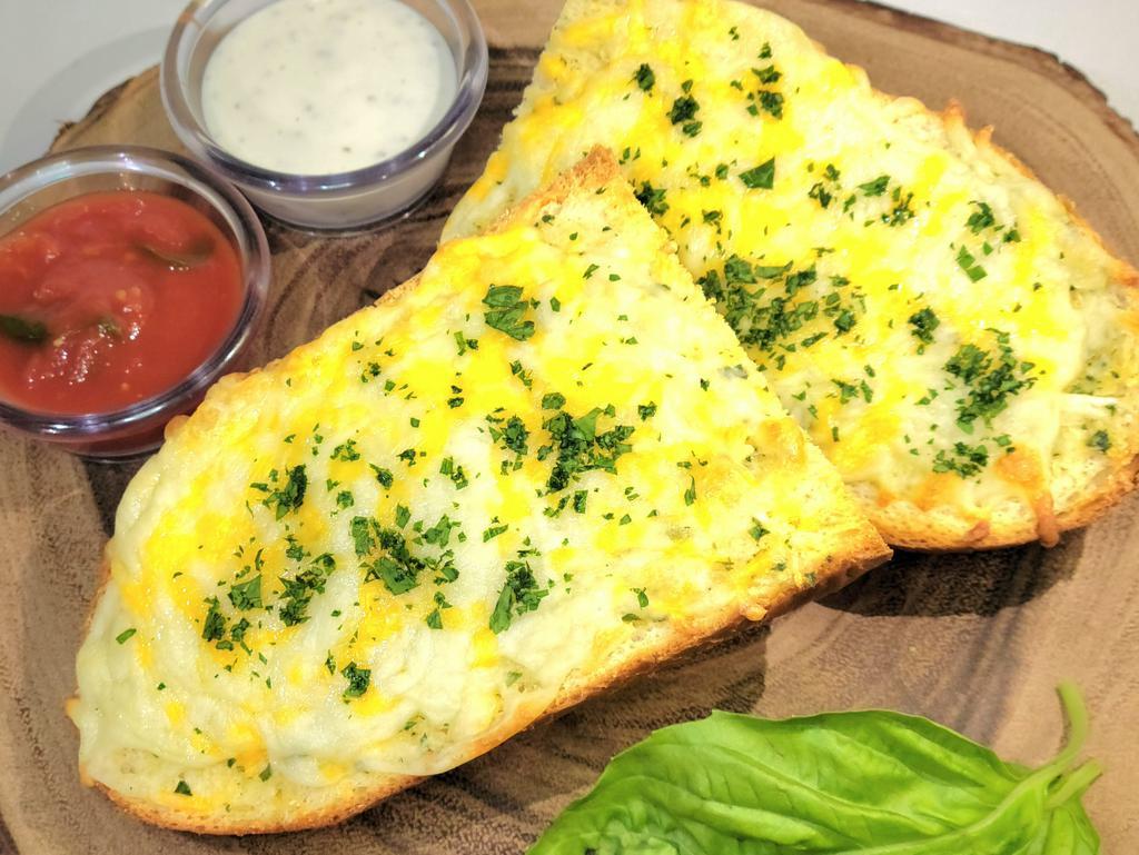 Cheese Garlic Bread · Topped with our Four Cheese combination served with our fresh Creamy Ranch dressing and Marinara sauce.