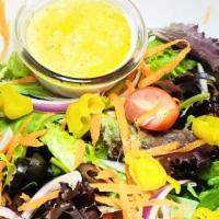 House · Mixed greens, Cherry Tomato, Onions,  Pepperoncini, Black Olives, Shredded Carrots, and your...