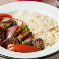 Asian Stir Fried Bowl · Stir-fried chicken or sirloin beef with our “Lomo Saltado” soy mix, paired with red onions, ...