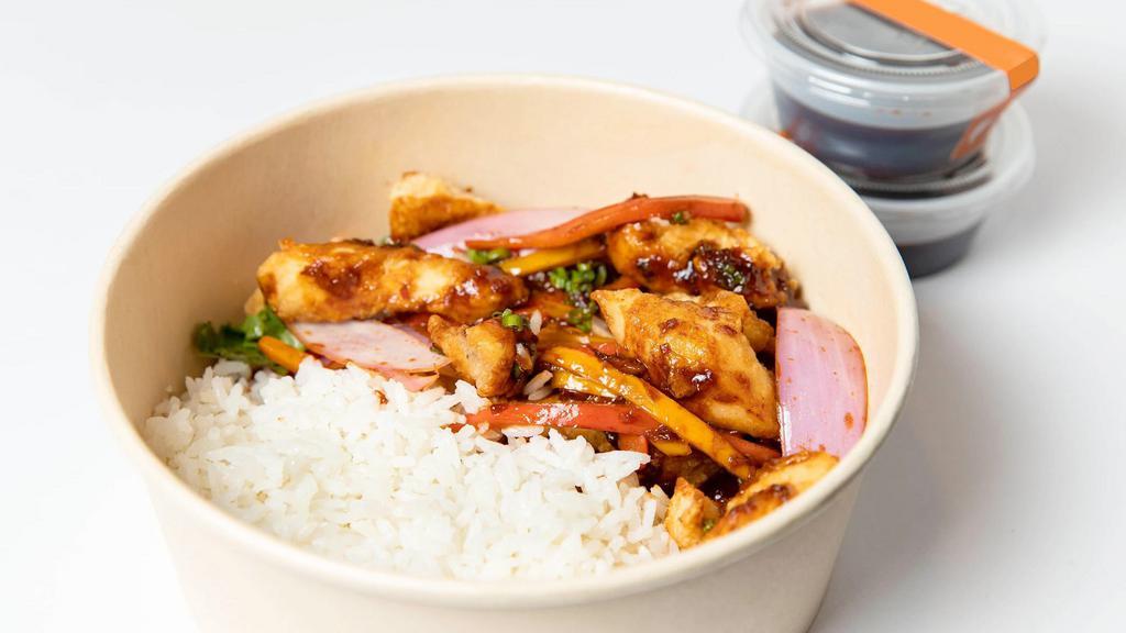 Sweet Chili Chicken Quinoa Bowl · Chicken stir-fry with red onions, bell peppers & our signature sweet chili sauce  (chilis, sesame, soy, ginger, garlic and sugar) on a bed of soft quinoa.