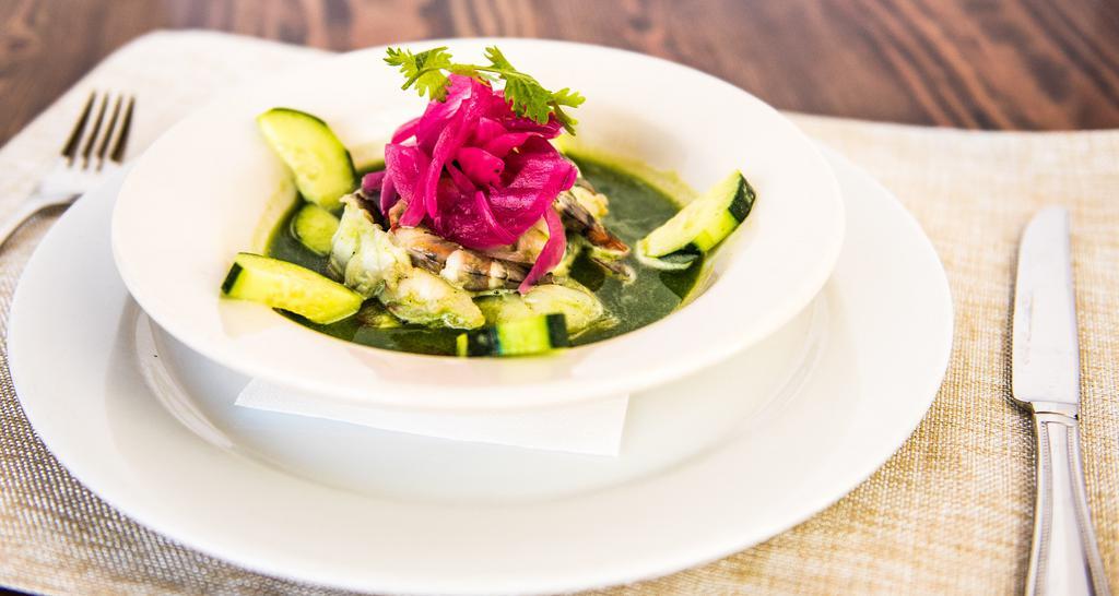 AguaChile · Mild or spicy. Shrimp marinated with jalapeno, cucumbers, cilantro, lime juice and pickled onions.