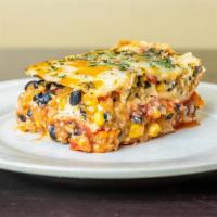 Mexican Lasagna (MX) · A lasagna with Mexican inspired flavors. Made with high-quality corn tortillas, grilled vegg...