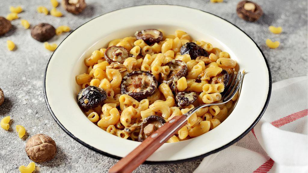 Mushroom Lover Mac & Vegan (MLM) · A rich mushroom mix, combined with a premium vegan cheese sauce, and a touch of black truffle oil. To satisfy all mushroom lovers! *Elbow pasta is produced in a factory that process eggs.