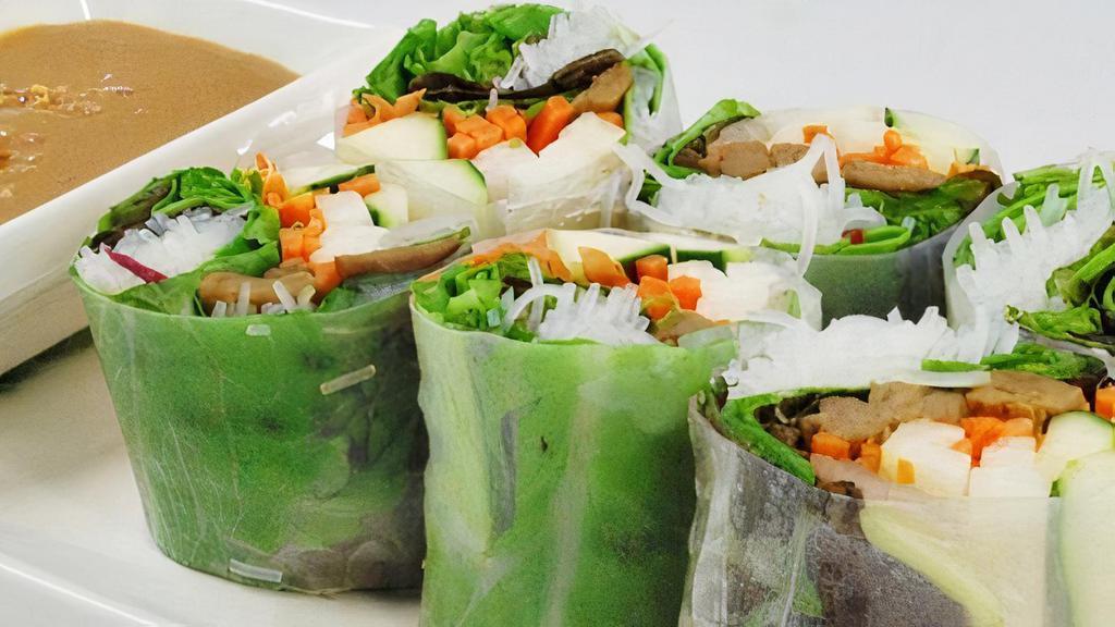 Fresh Rolls · Fresh rice paper rolls with mint, soy protein, jicama, cucumber, carrot, rice noodles & lettuce; served with a peanut dipping sauce (contains peanuts).