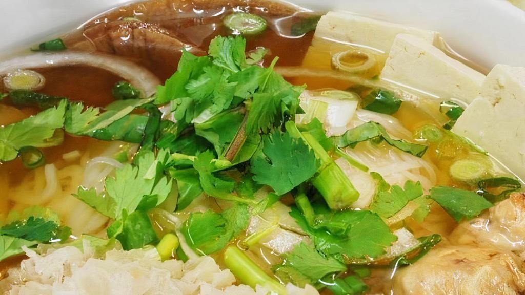Pho · Thin rice noodles, soy protein, mushroom, onion, tofu, bean sprouts, basil, and herbs in a freshly prepared broth (gluten-free).