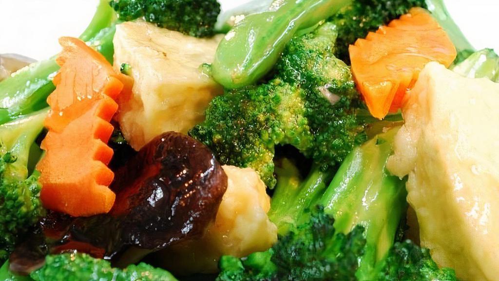 Broccoli Shiitake Tofu · Stir-fried broccoli, tofu, carrot and shiitake mushroom in a light mushroom sauce with onion (gluten-free).