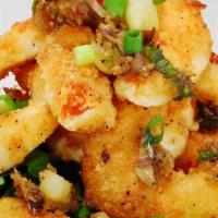 Spicy Cha Cha · Crumbed yam ﬂour crescents seasoned with mixed spices, red bell pepper, onion, garlic & chil...