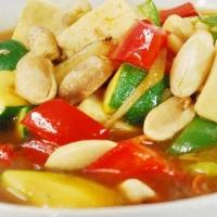 Kung Pao Tofu · Fresh tofu, zucchini, peanuts, red & green bell pepper; sautéed in a spicy sauce with chili ...