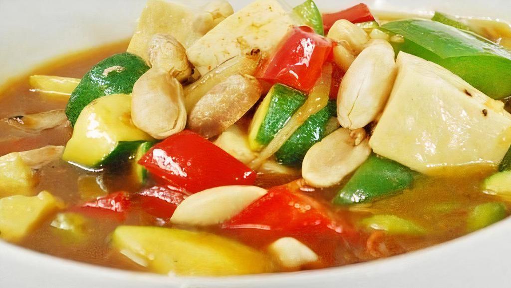 Kung Pao Tofu · Fresh tofu, zucchini, peanuts, red & green bell pepper; sautéed in a spicy sauce with chili (gluten-free; contains peanuts).