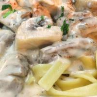 Stroganoff · Fettuccine in a creamy white sauce with soy protein, mushroom, onions & garlic; served with ...