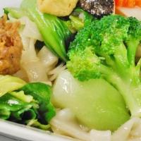 Chow Fun · Soft ﬂat rice noodles with tofu, soy protein, mushroom and mixed vegetables (sauce contains ...