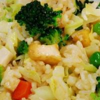 Gourmet Fried Rice · Traditional Chinese fried rice with cabbage, broccoli, peas, tofu, and carrot (gluten-free).