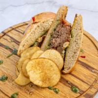 Asiago Meatball Sandwich · San Marzano tomato sauce, caramelized onions, on provolone cheese on a sourdough roll.
**Ser...