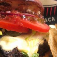 The Eastside Burger · Baca’s special burger blend, white & orange American cheeses, pickled jalapeño, candied baco...