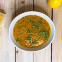 Curry Red Lentils · Tomato, chickpeas, organic quinoa and cilantro (gf,v).