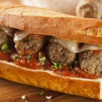 The Meatball Sandwich · Savory jumbo meatballs drenched in marinara sauce and mozzarella cheese stuffed in a homemad...