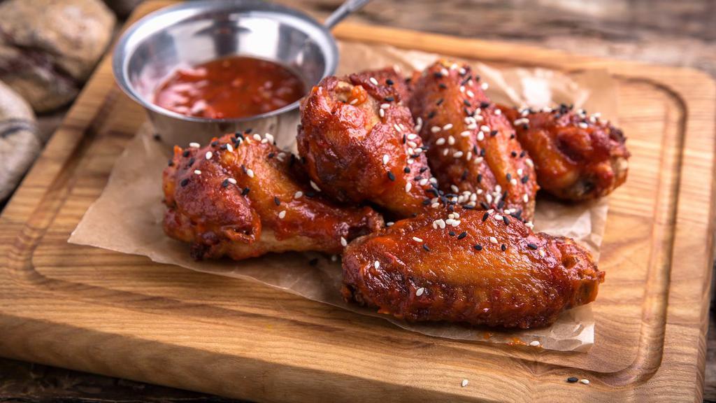 Bbq Chicken Wings · Crispy chicken wings tossed in sweet BBQ sauce. Served with bleu cheese or ranch.