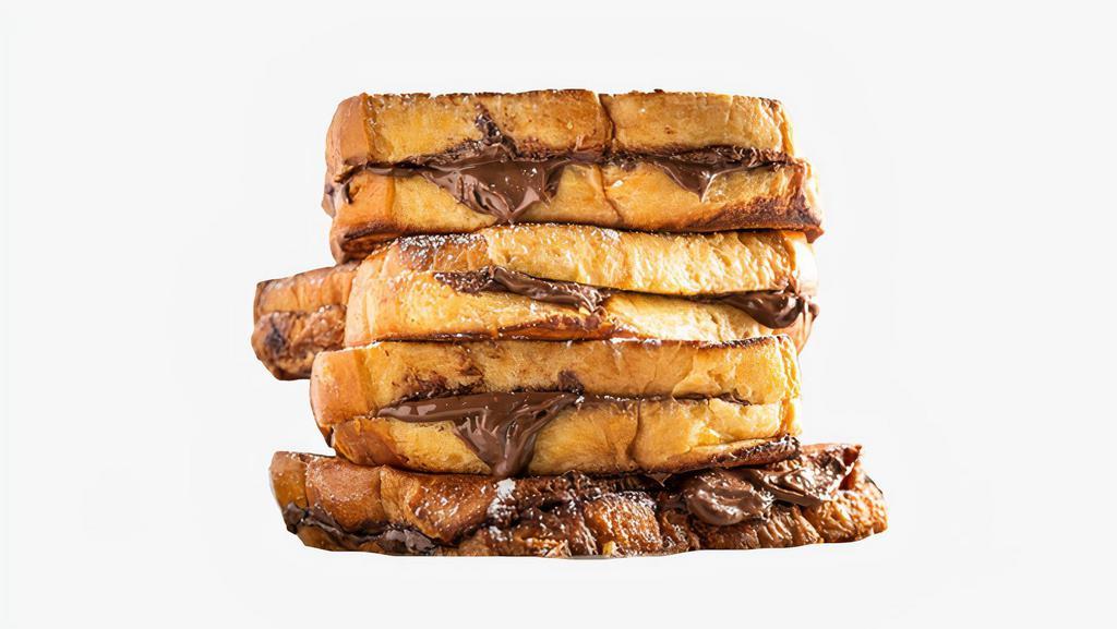 Nutella French Toast · Classic French toast with Nutella. Served with syrup on the side.