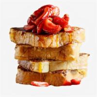 Strawberry French Toast · Classic French toast topped with strawberries. Served with syrup on the side.