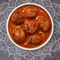 Chicken Tikka Masala · Fresh chicken breasts cooked in a creamy tomato gravy and freshly ground spices
