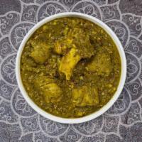 Lamb Saag · Lamb cooked in a spinach gravy infused with garlic, ginger, & fresh spices.