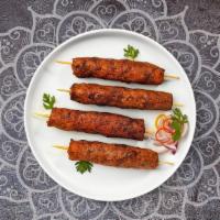 Beef Seekh Kabab · Tender beef cubes marintated in yoghurt and ground spices. Baked in a tandoor clay oven.