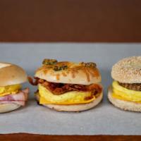 Eggmeat (Bagel) · Egg, meat and cheese on a bagel. Meat: Bacon, ham, sausage or turkey.

**If the selection is...