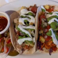 Tacos · Choice of three: rock cod, chicken. Shrimp vegetables, housemade slaw, crèma. Can be made (v...