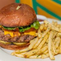 Binny's Burger · Beef patty, American cheese, lettuce pickles, grilled onions, mayo, fries. Add bacon or avoc...
