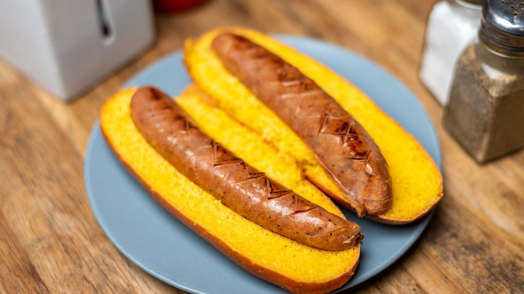 Sausages · Choice of bratwurst, kielbasa, applewood smoked chicken, hot link, or hot dog over brioche bun.