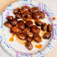 Spicy Duck Gizzards · 8 oz/ pk Vacuum packaged to extend shelf-life Ready to Eat.