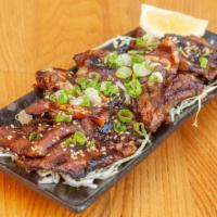 C10. BBQ Beef Ribs · Marinating beef ribs and grilled.