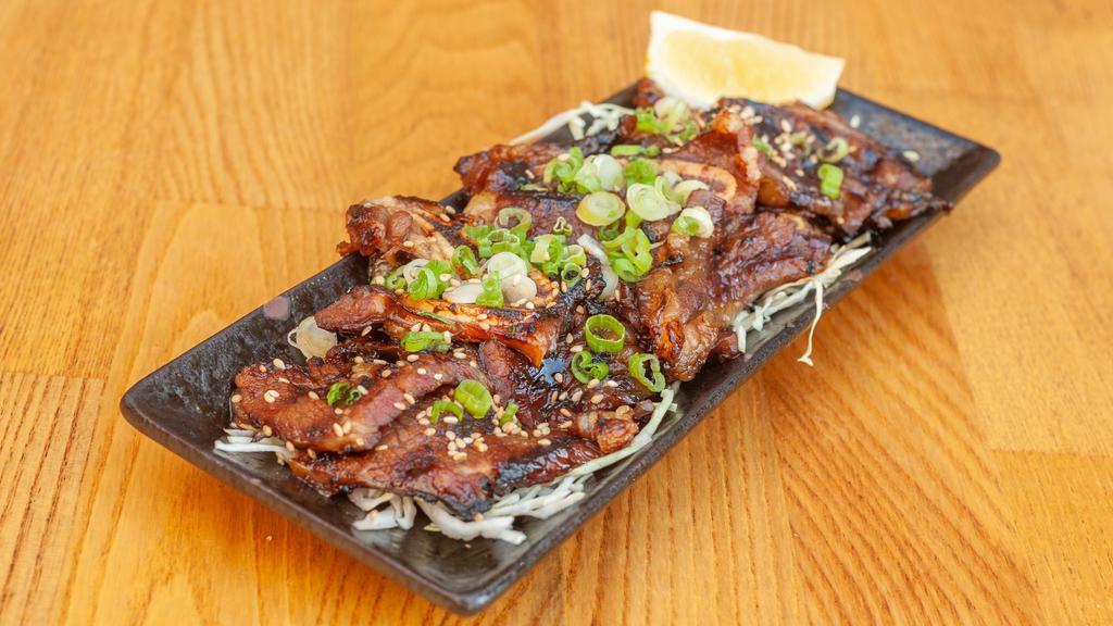 C10. BBQ Beef Ribs · Marinating beef ribs and grilled.